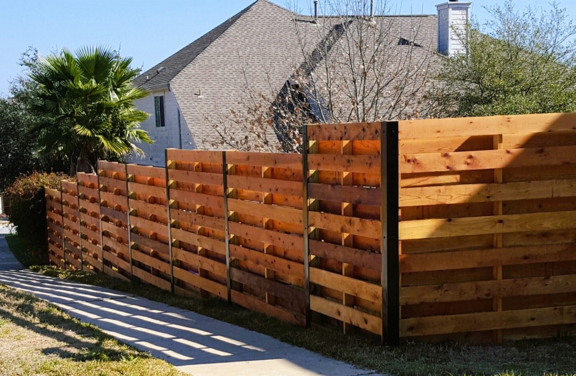 Modern horizontal wood fence with metal posts in Germantown, MD