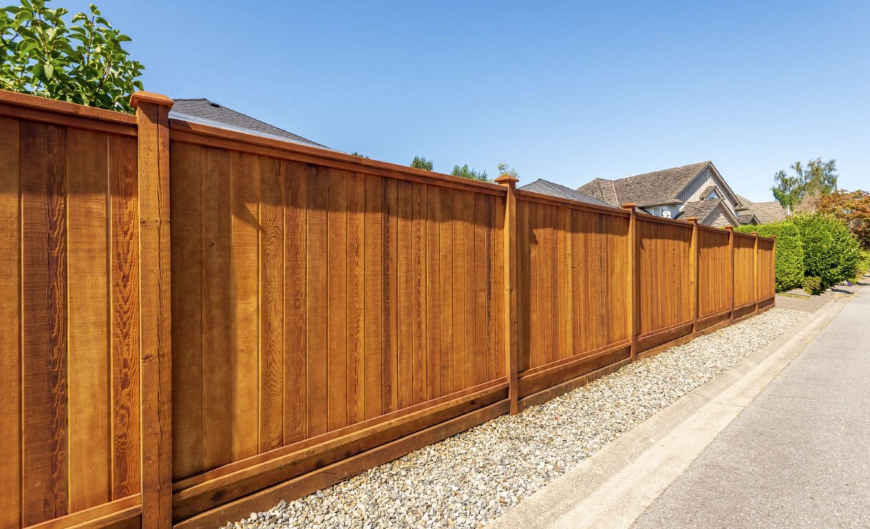 Stained wood privacy fence installation in Germantown, MD